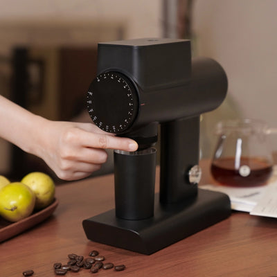 TIMEMORE Sculptor 064s grinder showcasing its sleek design and user-friendly dial for espresso enthusiasts.