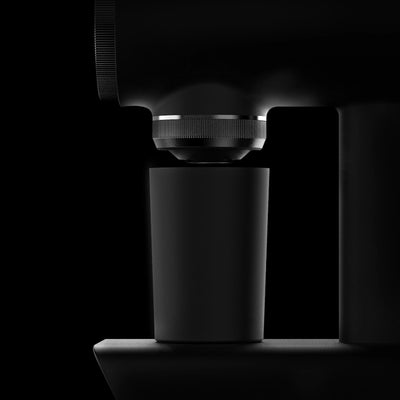 Close-up image of TIMEMORE Sculptor 064s grinder with a sleek black design.